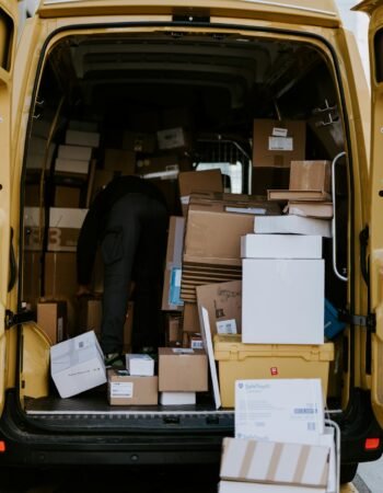 Cardboard parcels being loaded for delivery